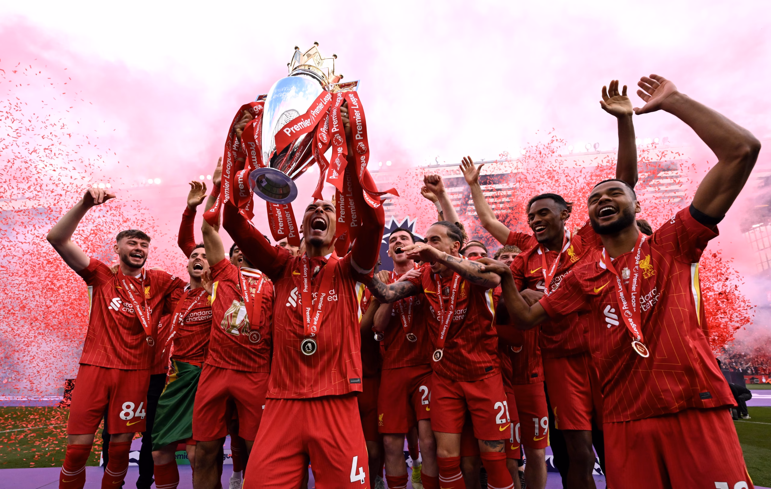 Liverpool raise the Premier League trophy as champions